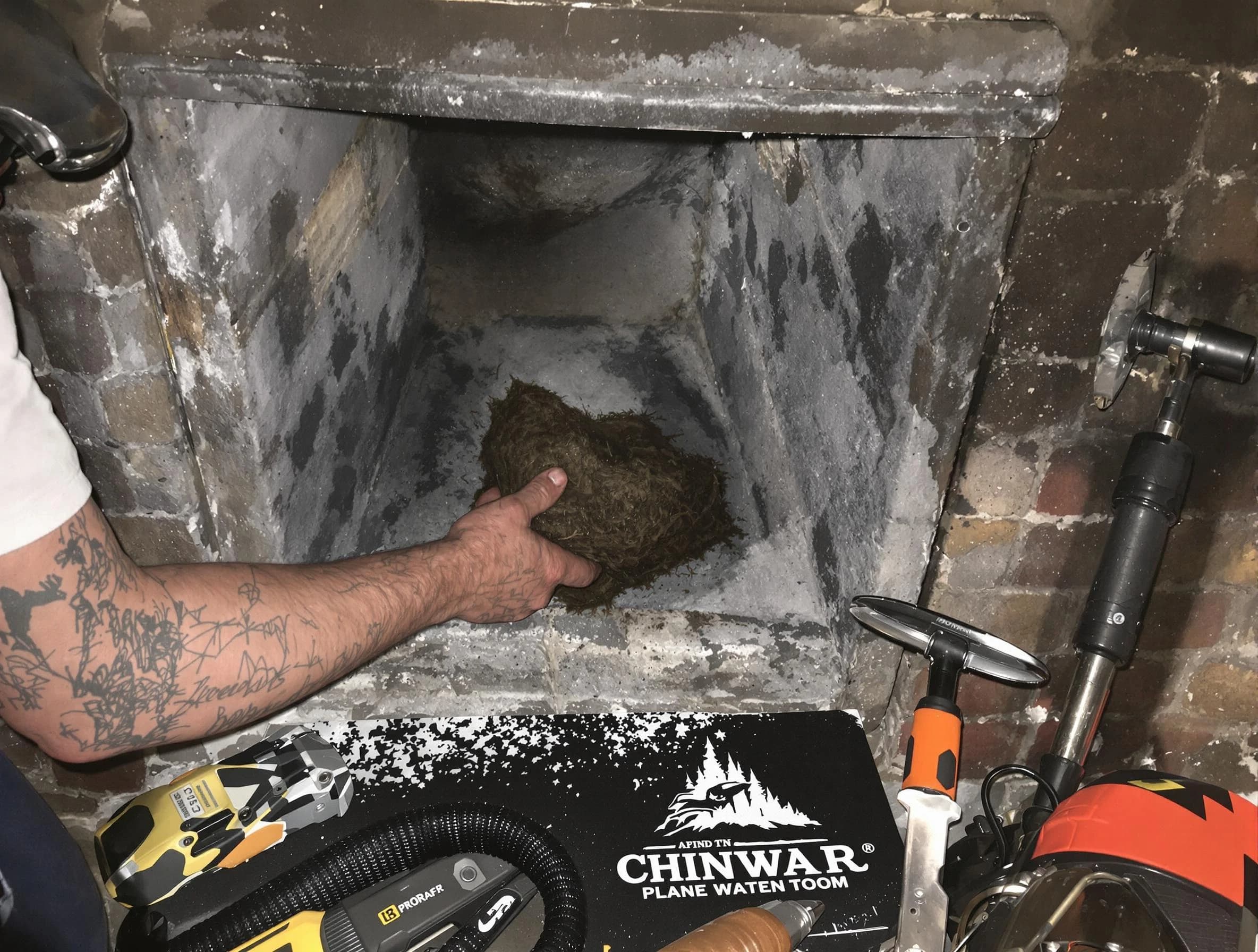 Cranford Chimney Sweep safely removing debris and screening chimney in Cranford, NJ